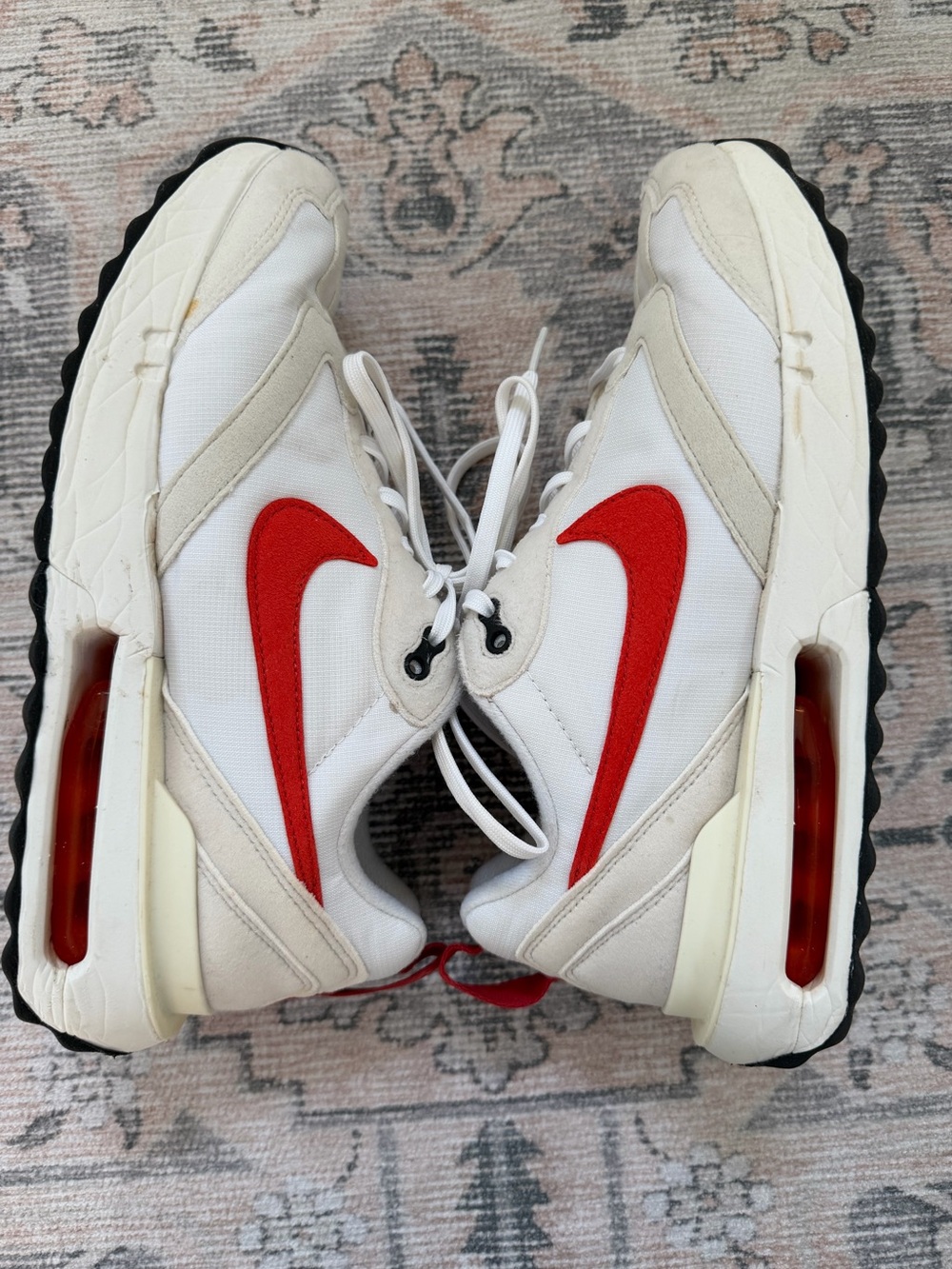 Nike Women’s White Sneakers with orange Swoosh